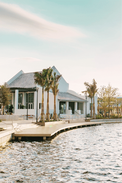 Exterior of an event space with with a dock by the waterfront