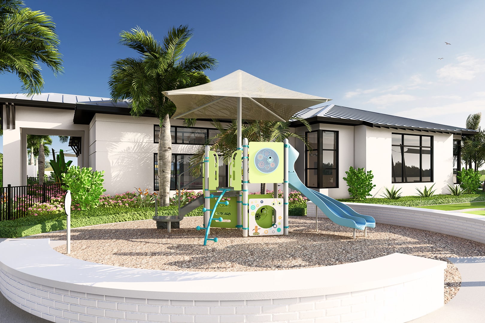 An outdoor playground next to a clubhouse at Sunstone Lakeside residential community