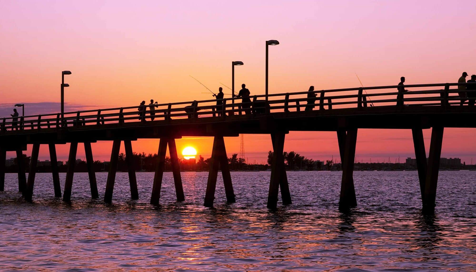 A bridge over water at Sunstone Lakeside park, a Wellen Park residential community