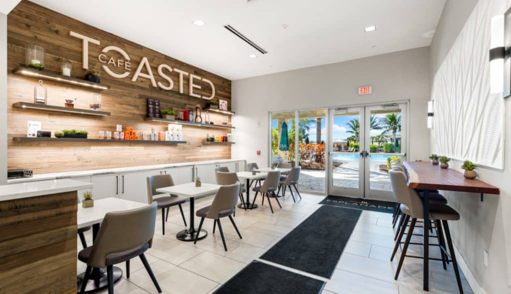 A cafe called Cafe Toasted situated by the pool at the Esplanade community at Wellen Park